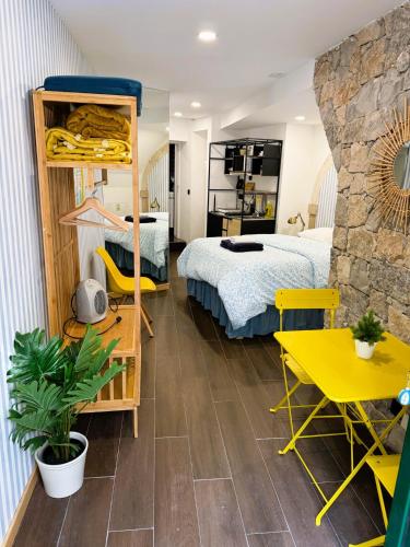 a bedroom with a bed and a bunk bed at Art Apartments Leiria Historic House in Leiria