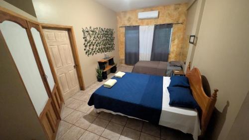 Llit o llits en una habitació de Guamacayan House