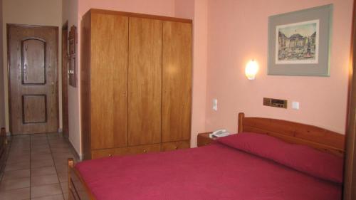 Spanias Hotelにあるベッド