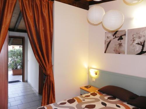 Postel nebo postele na pokoji v ubytování Hotel Universo