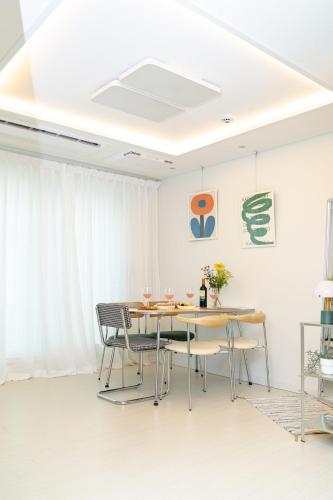 a dining room with a table and chairs at ABC Stay in Seoul