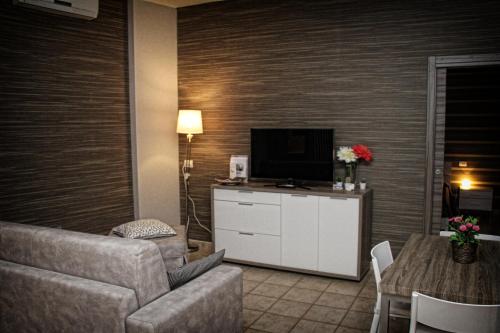 TV a/nebo společenská místnost v ubytování B&B ViaBrin 32
