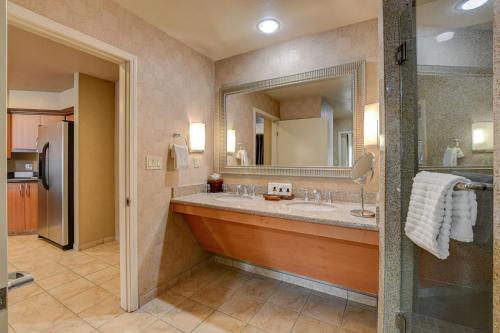 a bathroom with a sink and a mirror at Diamond Suite at Platinum Hotel in Las Vegas