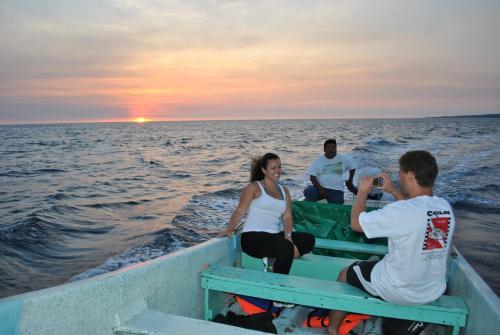 a group of people on a boat in the ocean at Cabañas Ecobiosfera in Catemaco