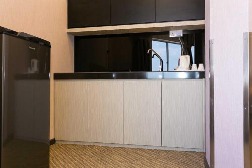 Kuchyň nebo kuchyňský kout v ubytování Icon Hotel Segamat