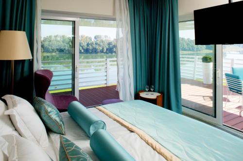 Postel nebo postele na pokoji v ubytování Hotel Navis