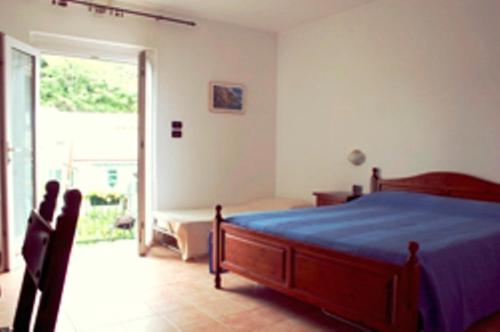 Un pat sau paturi într-o cameră la Hotel Del Sole