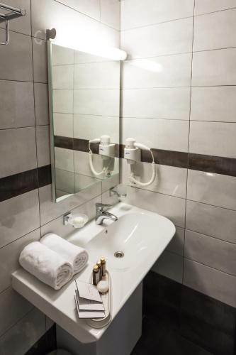 Ванная комната в Ark Palace Hotel & SPA