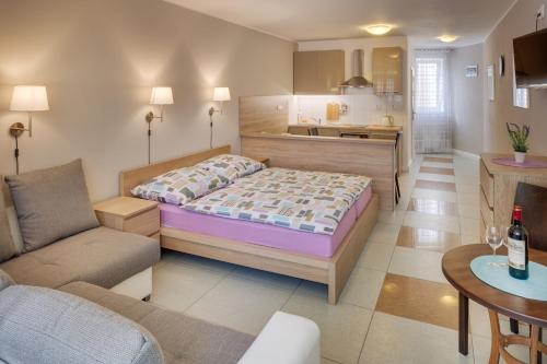 Postel nebo postele na pokoji v ubytování Apartements Studio 964