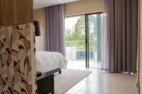 Postel nebo postele na pokoji v ubytování Simphiwe Guesthouse