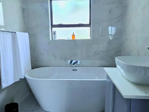 Et badeværelse på Simphiwe Guesthouse