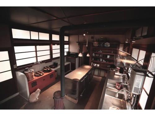 an overhead view of a kitchen with a stove at Maroya - Vacation STAY 16538 in Hamamatsu