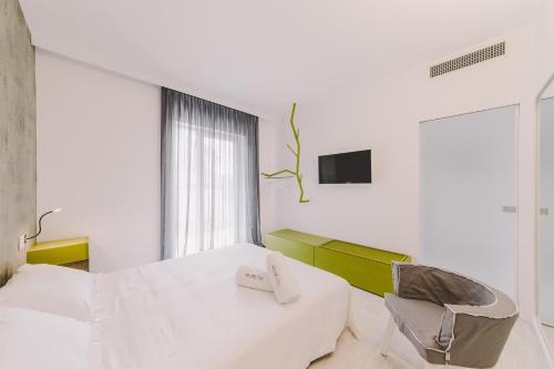 Postel nebo postele na pokoji v ubytování Suite 10 Home Design & Spa