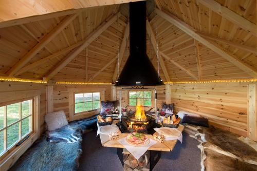an overhead view of a living room in a log cabin at Schmelmer Hof Hotel & Resort in Bad Aibling