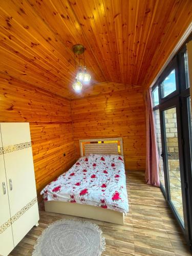 Llit o llits en una habitació de Quba Qecresh Aframe