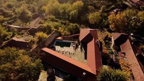 an aerial view of a house with a swimming pool at Han Gozdeika in Gozdeyka
