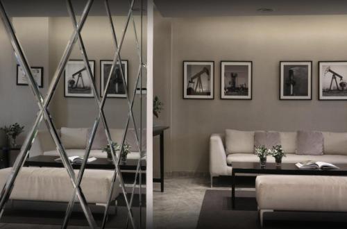a living room with a couch and a table at Agua del Corral Hotel & Spa in Mendoza