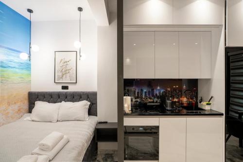 a bedroom with a bed and a bar at Serenity Nook by Sefi in Mesochórion