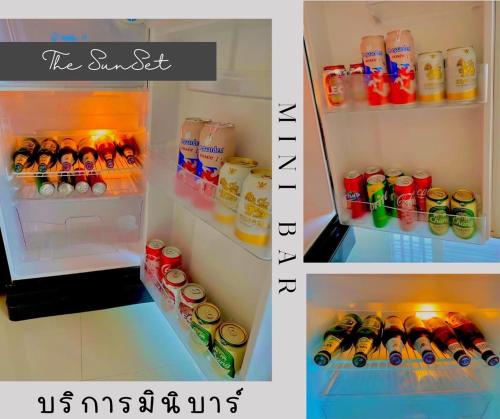 a refrigerator filled with lots of drinks and soda at Exclusive Sea View in Chon Buri