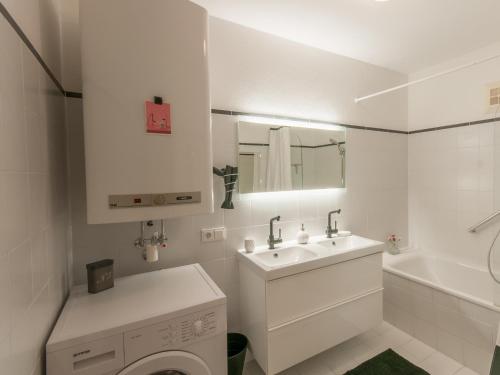 Ett badrum på Design Apartment Zell am See