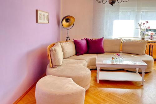 a living room with a couch and a table at Wildbiene in Lübbenau