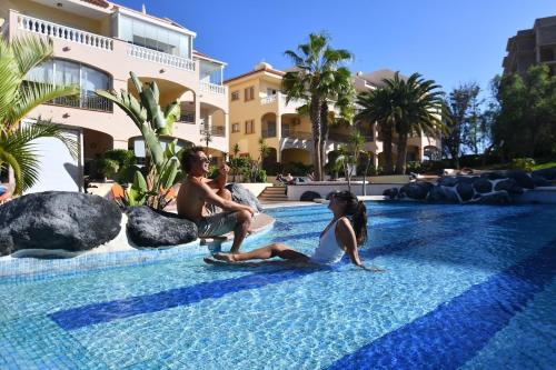 A bright apartment with a pool