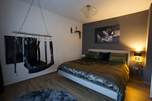 a bedroom with a bed and a mirror at RK Private Residence in Trautmannsdorf an der Leitha