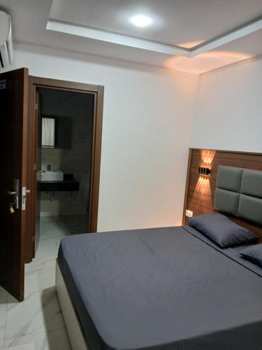 Llit o llits en una habitació de Yaya Hostel