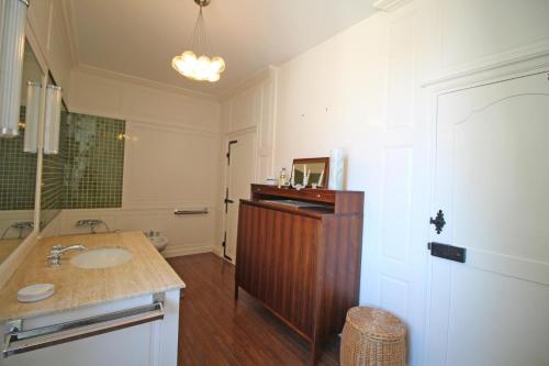 a bathroom with a sink and a mirror at Domaine de gensignac in Séreilhac