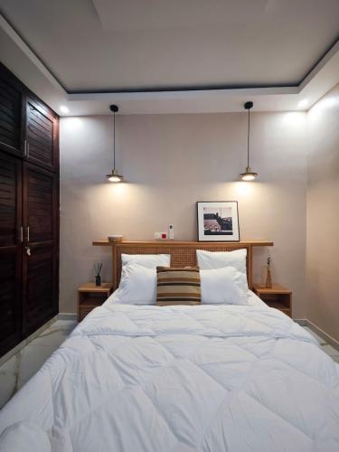 Postel nebo postele na pokoji v ubytování Sevane Home Apartment