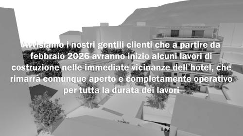 a black and white photo of a building at Hotel Stiegl Scala in Bolzano