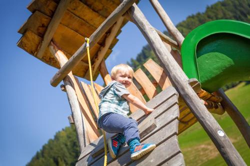 Kinder, die in der Unterkunft Hotel Tolderhof übernachten