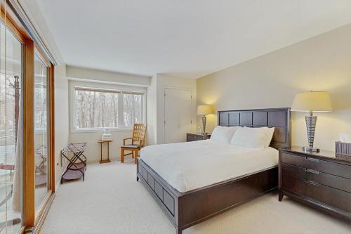 a bedroom with a large bed and a window at Southface #35 in Warren