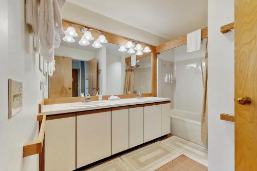 a bathroom with a sink and a mirror at Southface #35 in Warren