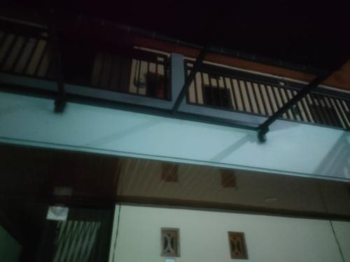 an overhead view of a balcony of a building at Udayana Bisma in Singaraja