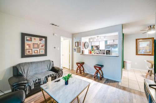 a living room with a couch and a table at 1 Bedroom apt w Swimming Pool Wifi Parking In Dallas TX in Dallas