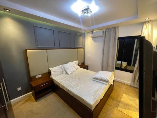 เตียงในห้องที่ Residence Ritz Douala