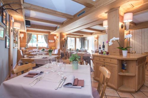 Ресторант или друго място за хранене в Alpi & Golf Hotel