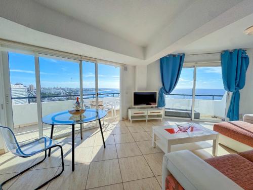 a living room with a view of the ocean at Club Villamar Exclusive Beachfront Penthouse in Adeje