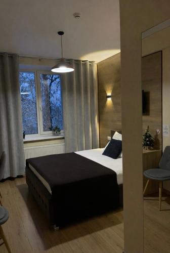 Lova arba lovos apgyvendinimo įstaigoje ROCAS Hotel