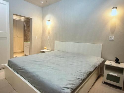 a bedroom with a large bed in a room at Seabreez Hideaway Escape in Dawn Beach