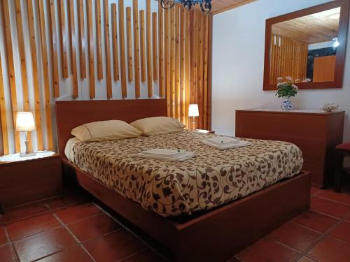 a bedroom with a bed in a room at Casa Santana in Nordeste