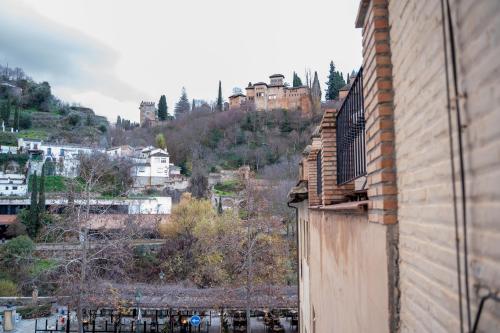 Piso para cuatro a los pies de la Alhambra
