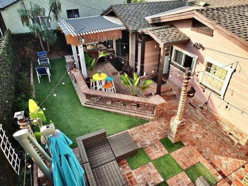 an aerial view of a house with a backyard at Eastside Garden Hideaway For 4 Perfect Location for World Cup Attendees in Long Beach