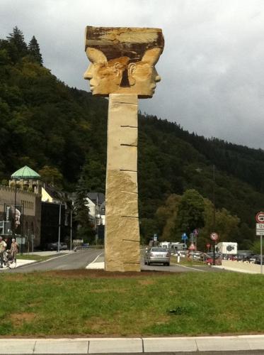 a sculpture of a head on the side of a road at Park-Hotel Traben-Trarbach in Traben-Trarbach