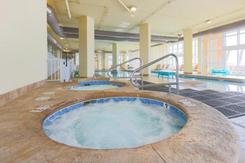 a large hot tub in the middle of a building at Phoenix Gulf Shores 903 in Gulf Shores