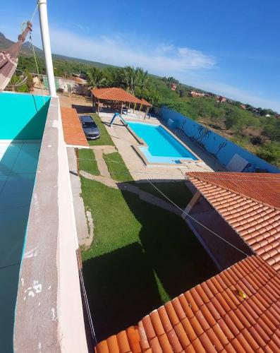 an overhead view of a roof with a swimming pool at Pousada Paraiso in Canudos