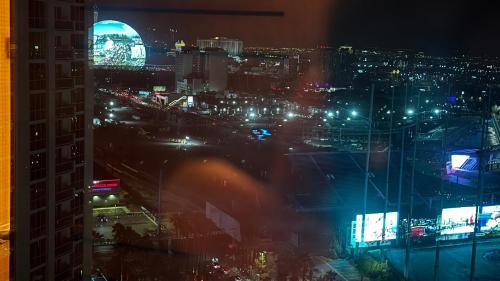 a view of a city at night with lights at MGM Signature-20-620 1Br 2Ba Balcony Suite in Las Vegas