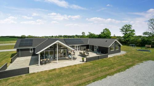 a rendering of a modular home with a backyard at Villavilla 441 - Grenå Strand, Østjylland in Grenå