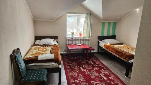Krevet ili kreveti u jedinici u okviru objekta Snow Leopard Hostel